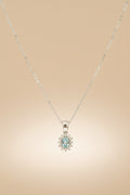 Colgante con cadena de oro blanco con Aguamarina talla oval y Brillantes naturales