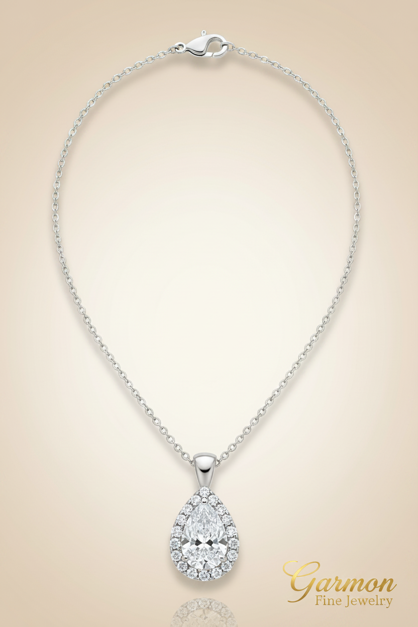 Collar de oro blanco con aguamarina natural talla pera y diamantes naturales — GARMON